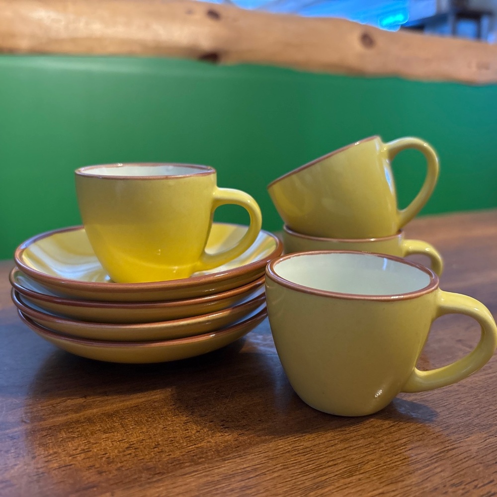 Imusa set of 4 yellow espresso cups with saucers.